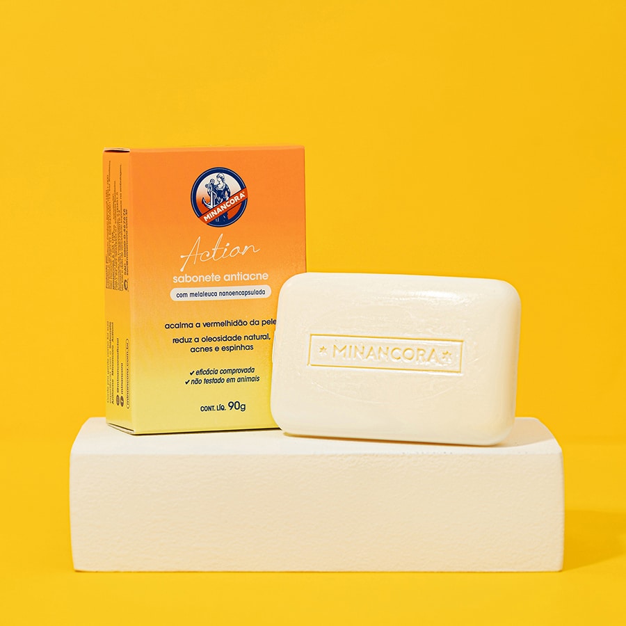 Sabonetes em Barra Antiacne Minancora, dentro e fora da embalagem, com um fundo amarelo